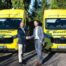 Guy Padfield-Wilkins (left), WCT managing director, with Mike Smith, of GM Minibus, at the handover of the new electric buses. (Tindle )
